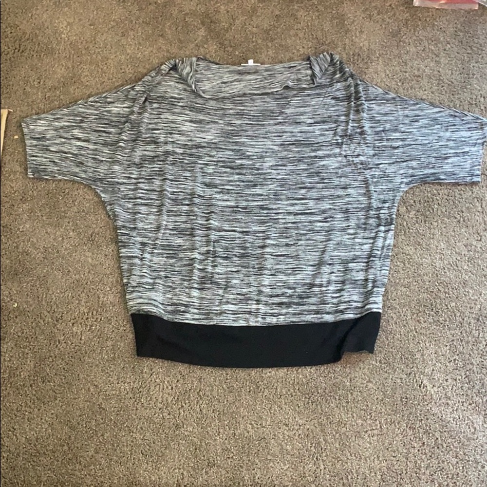 We have this  black , white, and gray Blouse